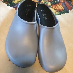 Used shoes by garden bag size 10/11